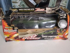 AMERICAN MUSCLE ERTL 1969 PONTIAC GTO GONE IN 60 SECONDS NEW