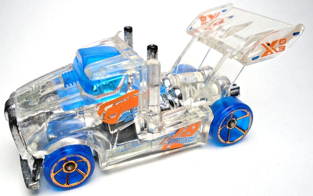 2017 HOT WHEELS X-RAYCERS RIG STORM CLEAR 2 3/4″ DIECAST SEMI CAB W BLUE ORANGE