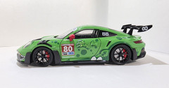 2023 Porsche 911 GT3 R IMSA featuring the “Rexy” dinosaur 1:24 Scale Diecast