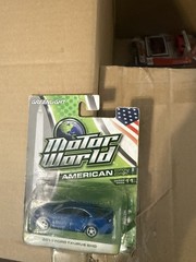 Greenlight 1/64 Ford Taurus 4 2 Blue 2 Black New