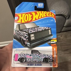 Hot Wheels 83 Chevy Silverado Black Widow Black Grey And Pink In Protector Pack