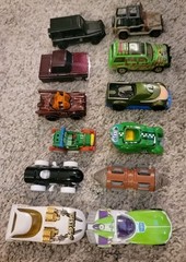 Lot Of 12 Movies,Characters Theme 1/64 Die-cast. Mostly Hot Wheels See Pictures.