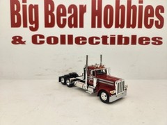 1/64 DCP Red With Silver Stripes Peterbilt 389 Day Cab Tractor