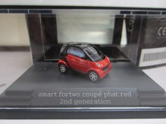 BUSCH L.E. SMART FORTWO COUPE PC in RED – model is PLASTIC – HO / 1:87 scale
