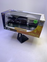 1/24 JADA DUB CITY KUSTOMS 2002 CHEVY SILVERADO BLACK