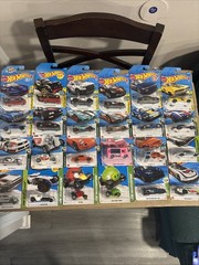 NIP Lot Of 24 Hot Wheels Mixed – Speed graphics- Retro Racers- HW Workshop- More