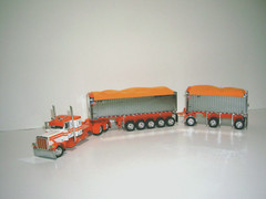 DCP FIRST GEAR 1/64 WHITE&ORANGE PETE 389 WITH 36″ SLEEPER GENESIS ll END DUMPS