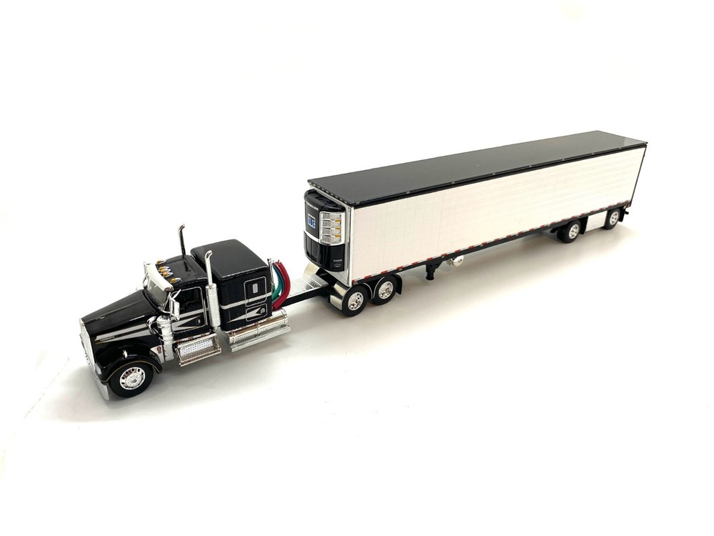 dcp kenworth w900 black and white 310″ frame with spread axle reefer