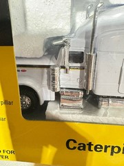 Caterpillar Corporate White Peterbilt Semi By Norscot 1/64th Scale