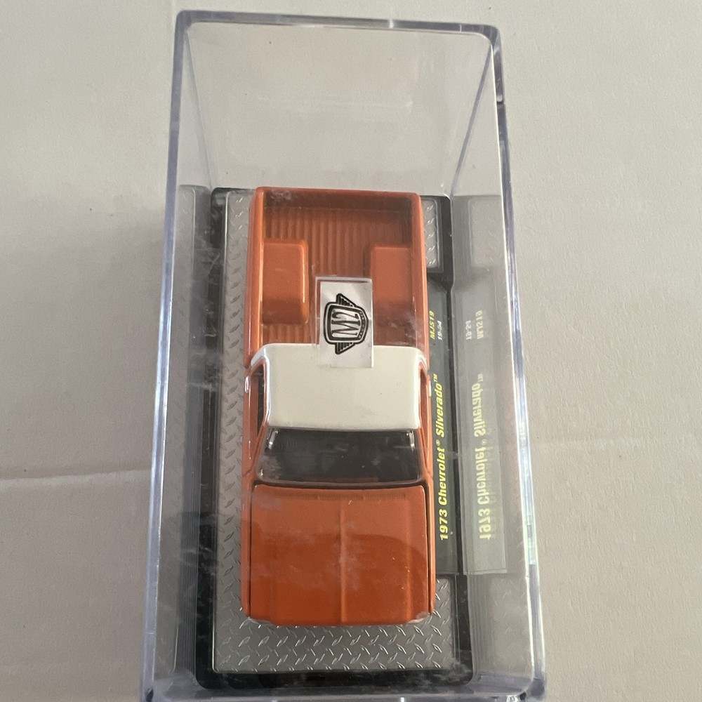 M2 Machines 1973 Chevy Silverado Orange/White 1:64 Diecast w/ Case