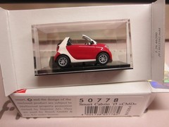 BUSCH 50778 SMART FORTWO CABRIO 2015 in RED – model is PLASTIC – HO / 1:87 scale