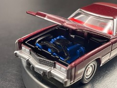 AUTO WORLD 1975 CADILLAC ELDORADO LUXURY CRUISER IN FIREMIST POLY W/RUBBER TIRES