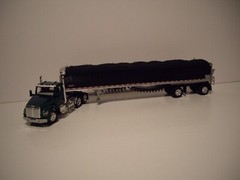 DCP FIRST GEAR 1/64 GREEN KENWORTH T880 DAYCAB & 50′ BLACK PATRIOT BELT TRAILER