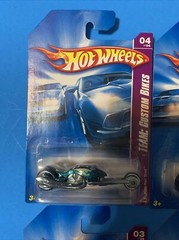 Hot wheels car lot of 4 cars as seen in picture. (Lot#36)
