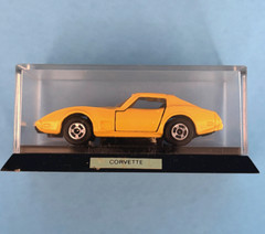 1977 Bright Yellow CHEVROLET CORVETTE 1:64 Die Cast Metal Toy Car HONG KONG- NIB