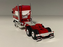 DCP 1/64 RED & WHITE KENWORTH K100 AERODYNE LONG FRAME W/CAT MOTOR