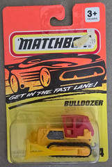 Matchbox Bulldozer, #64, 1/64, NIB, “Get In The Fast Lane”
