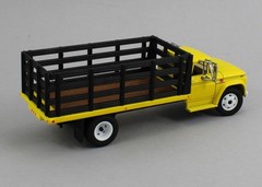 2026 DCP 1:64 *BRIGHT YELLOW & BLACK* 1963 GMC 4000 STAKEBED TRUCK *NIB*