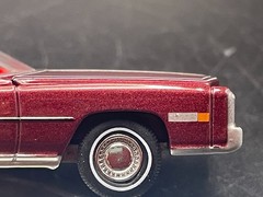 AUTO WORLD 1975 CADILLAC ELDORADO LUXURY CRUISER IN FIREMIST POLY W/RUBBER TIRES