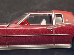 AUTO WORLD 1975 CADILLAC ELDORADO LUXURY CRUISER IN FIREMIST POLY W/RUBBER TIRES
