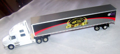 Ertl Volvo GMC Die Cast Tractor Trailer Semi Truck JX TRUCK CENTER 50 YRS