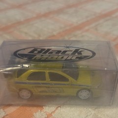 Black Magic 1:64 Yellow Diecast Model Car w/ Clear Display Case