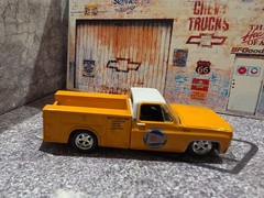 M2 Machines 1975 GMC Sierra Grande 15 Holley Yellow 1:64 Diecast Truck