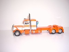 DCP FIRST GEAR 1/64 WHITE&ORANGE PETE 389 WITH 36″ SLEEPER GENESIS ll END DUMPS