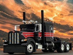 1/64 DCP BLACK/RED/SILVER PETERBILT 389 W/ 63″ FLAT TOP SLEEPER