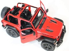 Authentic 1:34 Scale Jeep Wrangler Rubicon Die-Cast Toy Car in Red; Indoor Play