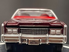 AUTO WORLD 1975 CADILLAC ELDORADO LUXURY CRUISER IN FIREMIST POLY W/RUBBER TIRES