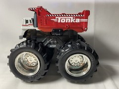 Tonka Red & White Dump Monster Truck NOT SURE OF SCALE SIZE ITS 4 INCHES LONG