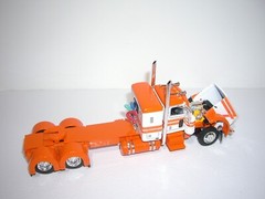 DCP FIRST GEAR 1/64 WHITE&ORANGE PETE 389 WITH 36″ SLEEPER GENESIS ll END DUMPS