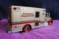 NEW UN-OPENED Ser# 005 — SMOKEY BEAR 60th Anniversary IH 4400 EMS Unit 18-3403