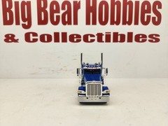 1/64 DCP Blue With Silver Stripes Peterbilt 389 Day Cab Tractor