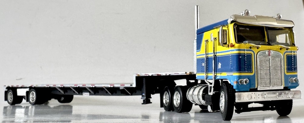 DCP First Gear Kenworth K100 COE Blue Yellow Spread Axle Stepdeck Trailer 32967